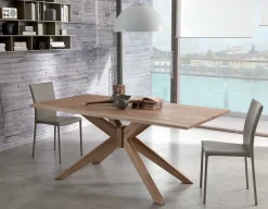 TAVOLO IN VETRO CON BASAMENTO CENTRALE A STELLA